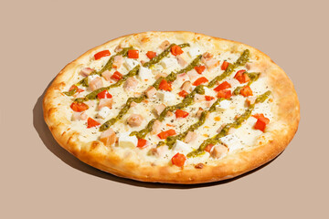Crispy pizza adorned with vibrant basil pesto, savory cubes, and peppers, perfect for Pi Day feasting or whimsical brunch gatherings