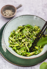Asian style chuka wakame seaweed or sea mustard, cucumbers, green lettuce and sesame seeds fresh salad