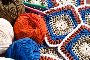 A bright crochet project using cotton threads. Granny square.