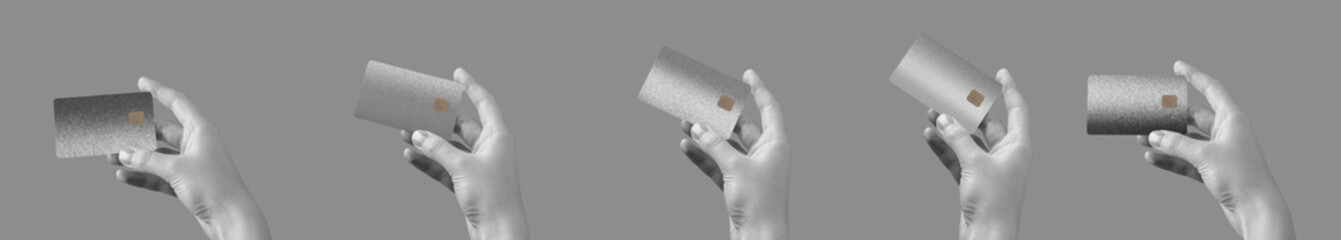 A hand holding a premium credit card, showcasing secure, cashless payment. Elegant gray and black