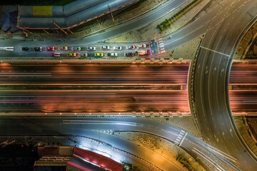Expressway, Self-driving autonomous electric cars of the future with HUD elements move along a busy traffic intersection. Concept: Artificial Intelligence, Car Scan, GPS Tracking, Smart Roads, IoT
