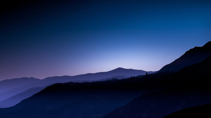 Mountain silhouette under twilight sky, serene blue tones blending into dusk, nature's quiet grandeur