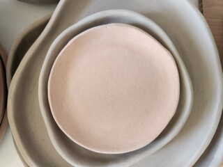 handmade ceramic plates with earthy colors
