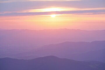 Obraz premium Serene Sunrise Over Misty Mountains A Breathtaking Landscape