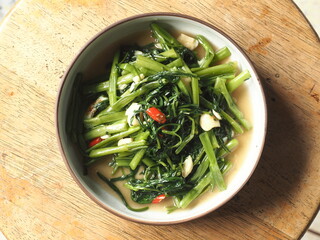 stir fried water spinach or morning glory with garlic and chili
