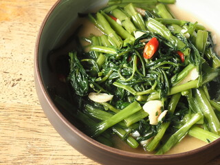 stir fried water spinach or morning glory with garlic and chili