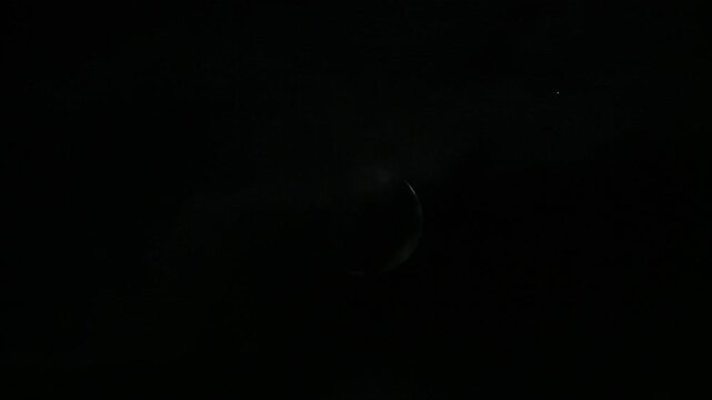 Crescent moon behind moving clouds — 4K time-lapse (30fps)