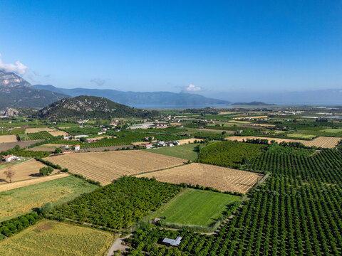 Aerial view of Ortaca city in Mugla, Turkiye, featuring lush green vegetation and mountains