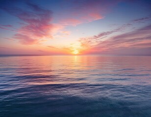 Obraz premium Peaceful Ocean Sunset with Colorful Sky and Calm Waves – Tranquil Seascape Horizon