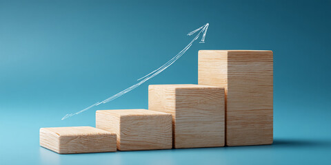 Wooden blocks ascending, arrow pointing upward on blue background, showcasing growth, success, progress, and upward trajectory