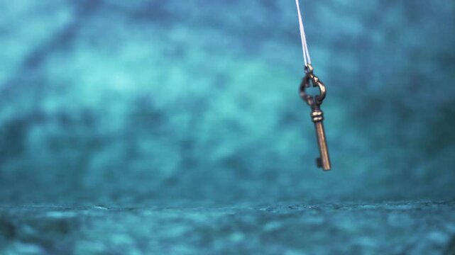 Hanging success key. Life coaching, mentorship, solution background with copy space.