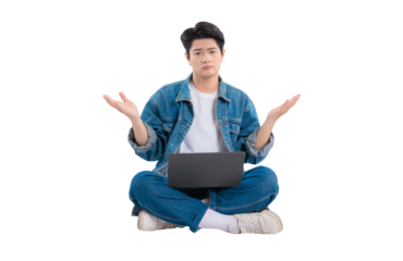 Full body image of Asian guy using laptop on png background	