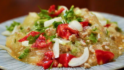 Yam Woon Sen Goong, Thai spicy glass noodle salad with seafood and cilantro © Tyada_Nam