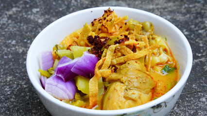 Northern Thai food (Khao Soi), Spicy curry noodles soup with chicken, Local Thai food