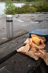 Flask of Coffee, with a Cheese scone and a mixed fruit scone, picnic Near Rothbury, Northumberland. May 2025
