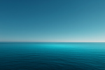 Quiet blue sea surface and clear sky
