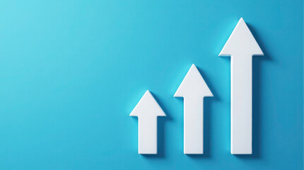 Fototapeta premium Three white arrows pointing up symbolize growth and progress on a textured blue background