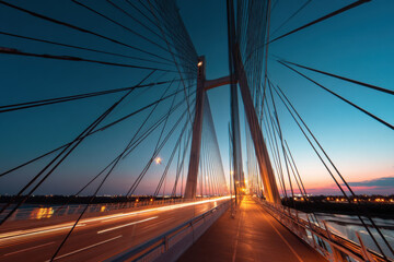 Obraz premium Dynamic modern suspension bridge view at twilight, impressive