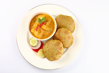 Puri with potato curry served with salad