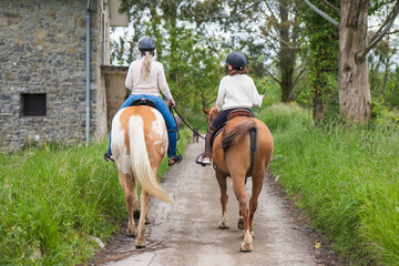 Family bonding during a delightful farm day horse ride