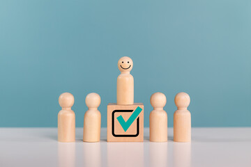 Elections, candidates, volunteers, recruitment. Smile wood person model standing above wood block...