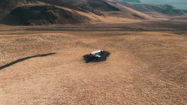 Cinematic 4K Aerial Footage of Abandoned Military Aircraft Wreck in Icelandic Grassland