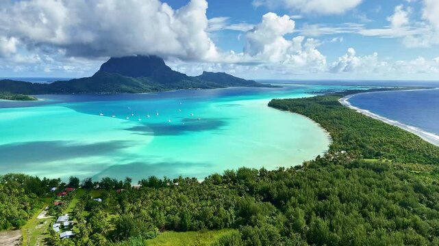 Drone aerial view Bora Bora Tahiti. Tropical paradise island, turquoise crystal clear water lagoon. French Polynesia. Exotic travel vacation getaway, romantic honeymoon destination