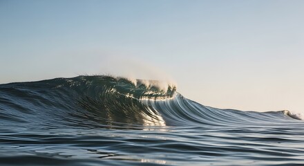 Minimalist wave crest isolated against a clear sky