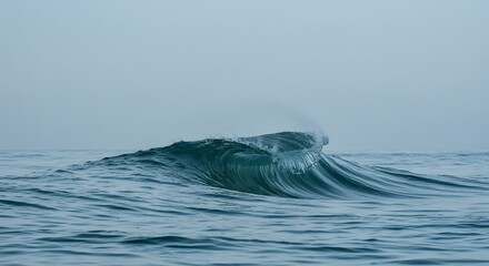 Minimalist wave crest isolated against a clear sky