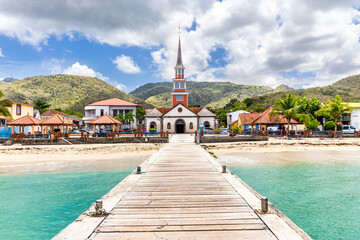 Les Anses dArlet and its iconic church in Martinique, France. Les Anses d Arlet is a town and commune in the French overseas department and region of Martinique.