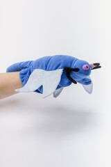 Blue bug hand puppet on a white backdrop