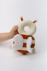 Baby bumblebee safety backpack on white background