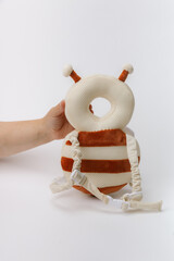 Baby bumblebee safety backpack on white background