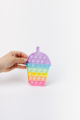 rainbow pop toy for children shaped like boba cup