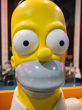 Parma, Italy - march 15 2025: Yellow Homer Simpson close-up Statue with big Eyes