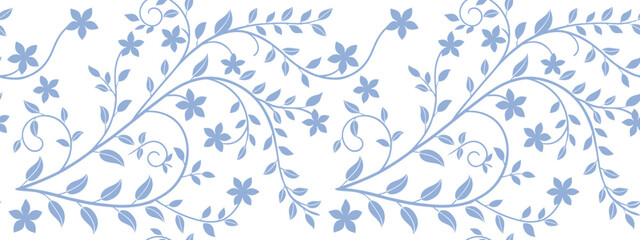 Delicate floral swirl pattern in soft blue featuring trailing vines, tiny leaves, and simple blossoms. Ideal for fabric, wallpaper, or digital backgrounds. A timeless and graceful decorative motif. © Sk