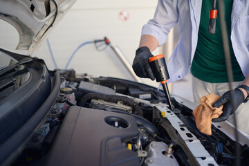 Car maintenance involves checking oil levels and ensuring engine is clean