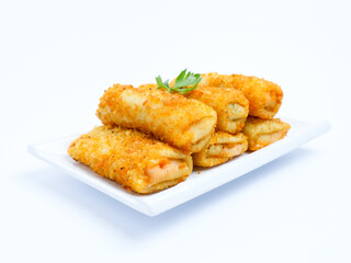Indonesian crispy risol mayo filled with sausage and soft mayonnaise, served on a white plate with parsley garnish on a white background. Perfect photo of a traditional snack.