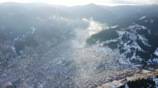 Aerial footage establishing small town in the mountains