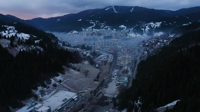Aerial footage establishing small town in the mountains