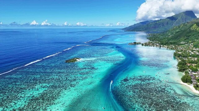 Drone Tahiti. Aerial Moorea island, view of clear water lagoon, boats and tours in French Polynesia. Exotic travel vacation getaway, Famous tourism romantic honeymoon destination. 
