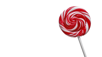 A single red and white striped lollipop on a stick against a solid black background in the studio isolated on transparent background