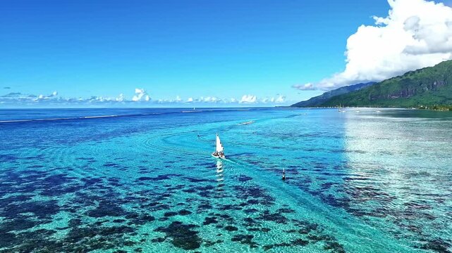 Drone Tahiti. Aerial Moorea island, view of clear water lagoon, boats and tours in French Polynesia. Exotic travel vacation getaway, Famous tourism romantic honeymoon destination. 