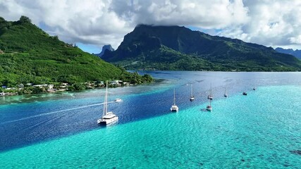 Drone Tahiti. Aerial Moorea island, French Polynesia. Crystal clear water blue lagoon. Exotic travel vacation getaway, romantic honeymoon destination. Famous tourism destination.  - Powered by Adobe