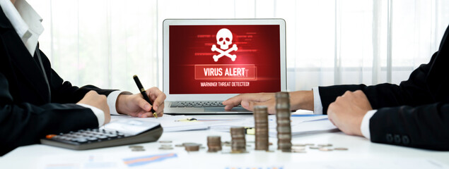 Virus warning alert on computer screen detected brisk cyber threat , hacker, computer virus and...