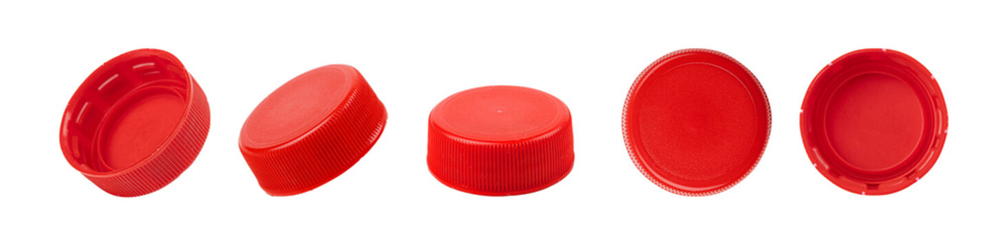 Five red plastic bottle caps from different angles