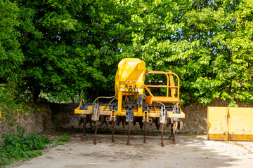 Agricultural plough in a farmyard
