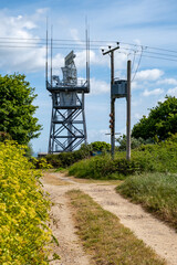 Radar on top of a tower in the countryside