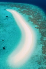 Serene Sandbar in the Ocean: An aerial shot captures a serene sandbar embraced by a turquoise ocean, creating a breathtaking display of natural beauty and coastal wonder.