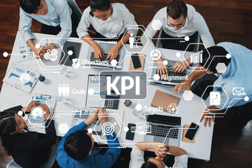 A dynamic business meeting focused on key performance indicators (KPI), showcasing a team engaged...